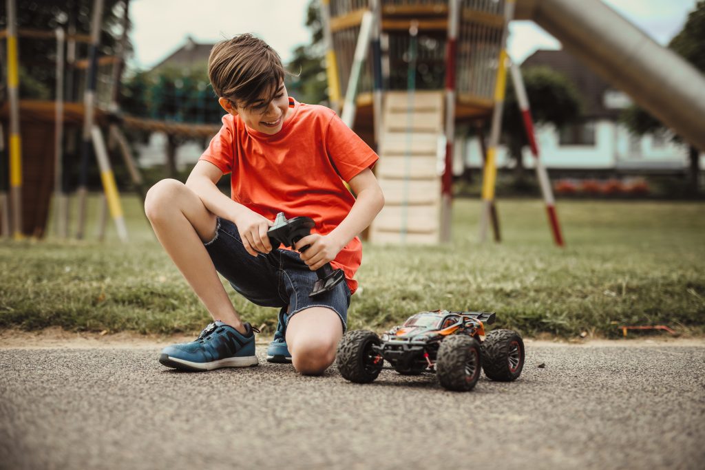 Boy playing with RC car
